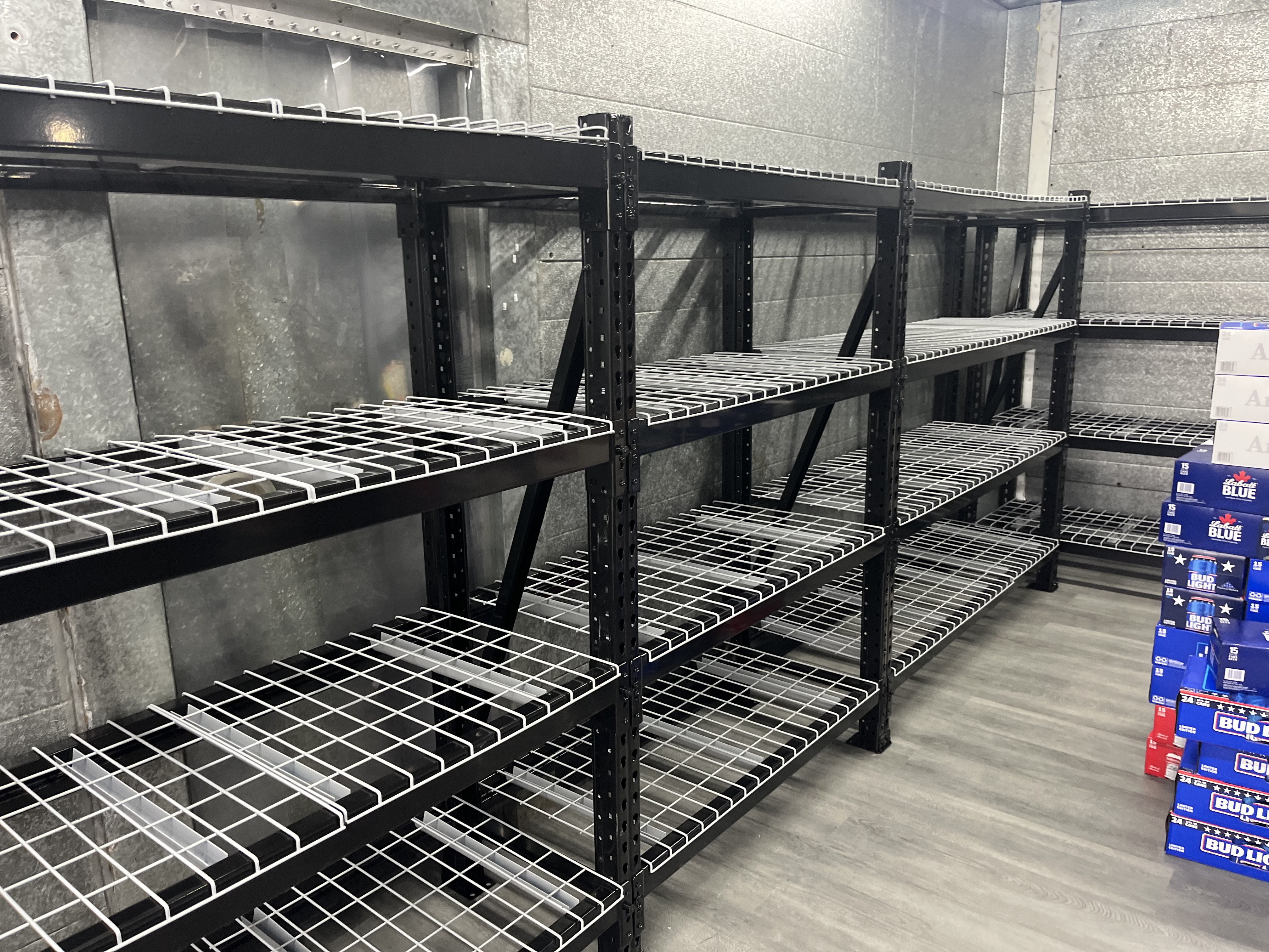 Walk-in cooler shelving system